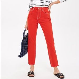 Red straight leg jeans